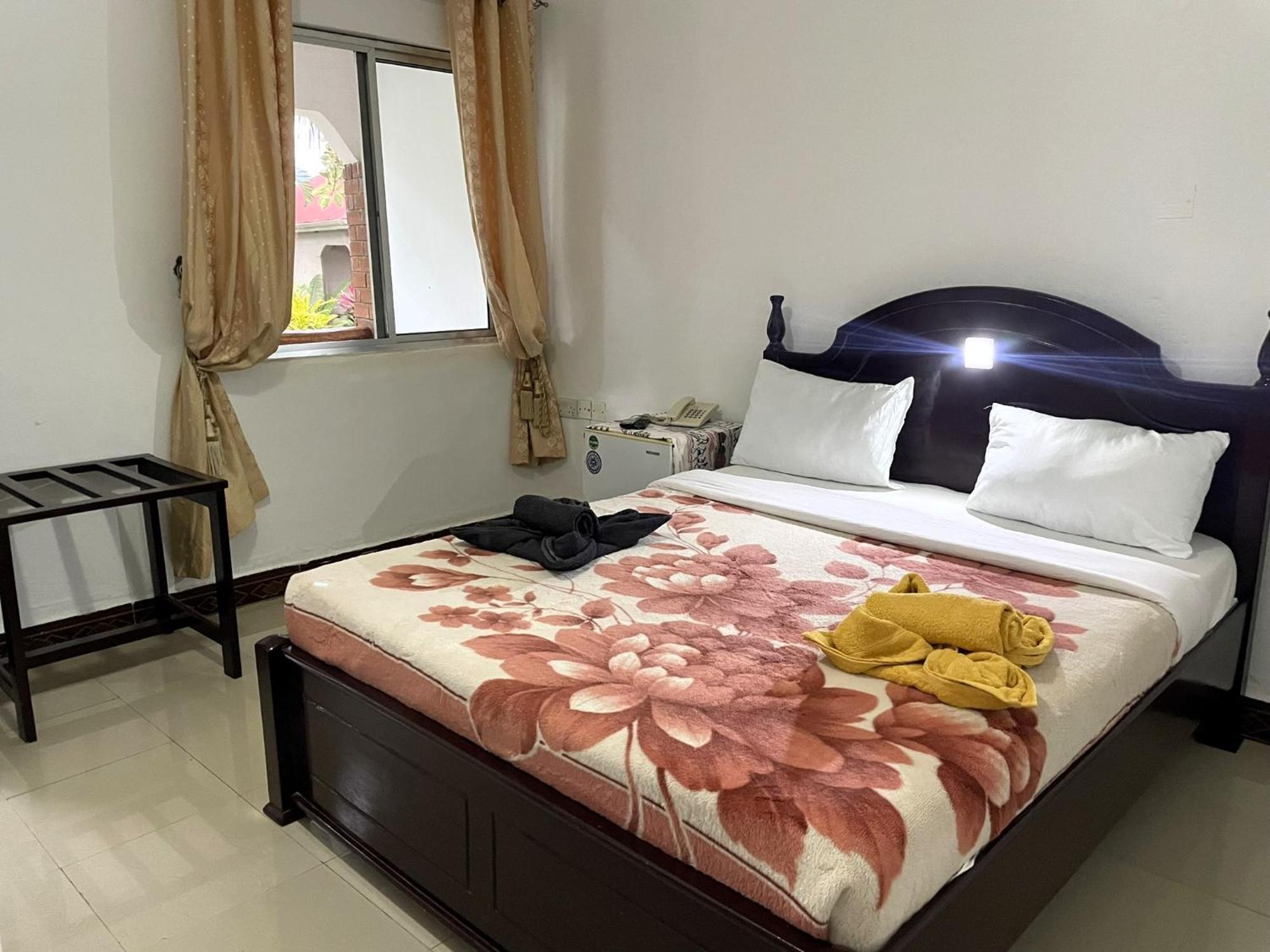 Home Feeling Neneu Lodge Moshi Exterior photo